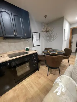Una cocina o zona de cocina en ENCANTADOR apartamento RENOS