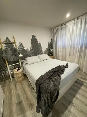 Cama o camas de una habitación en ENCANTADOR apartamento RENOS