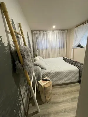 Cama o camas de una habitación en ENCANTADOR apartamento RENOS