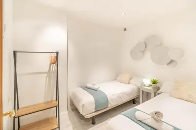 Cama o camas de una habitación en Acogedor apartamento en el corazón de Pamplona