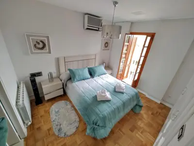 Cama o camas de una habitación en Piso confort céntrico y vistas Registro turismo VAT 01693