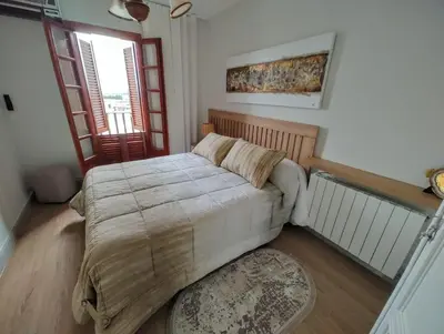 Cama o camas de una habitación en Piso confort céntrico y vistas Registro turismo VAT 01693