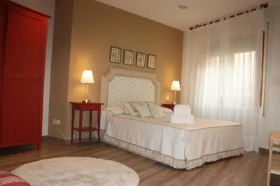 Cama o camas de una habitación en Apartamento Turístico Cigüeña de Alfaro
