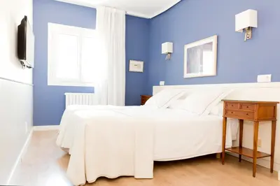Cama o camas de una habitación en Hotel Sauce
