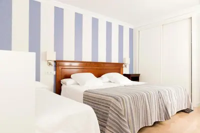 Cama o camas de una habitación en Hotel Sauce