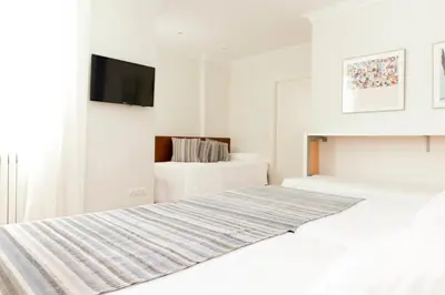 Cama o camas de una habitación en Hotel Sauce