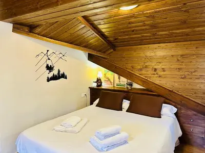 Cama o camas de una habitación en CA DEL SASTRET -Durro-