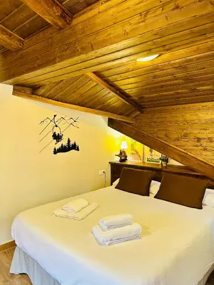 Cama o camas de una habitación en CA DEL SASTRET -Durro-