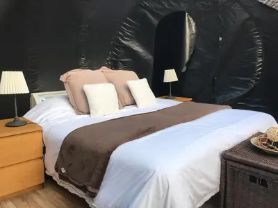 Cama o camas de una habitación en Frontera Bungalow Park