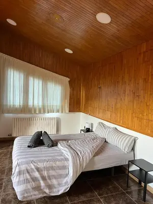 Cama o camas de una habitación en Casa en el Balcón del Pirineo