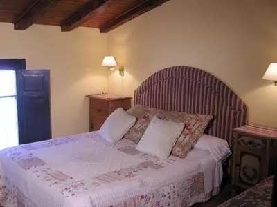 Cama o camas de una habitación en La Fabrica Casa Rural