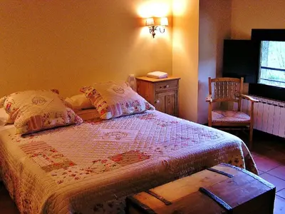 Cama o camas de una habitación en La Fabrica Casa Rural