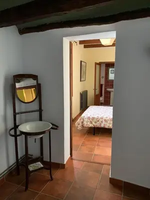 Cama o camas de una habitación en Masia Cal Millàs - Turisme Rural