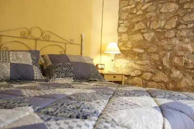 Cama o camas de una habitación en Masia Cal Millàs - Turisme Rural