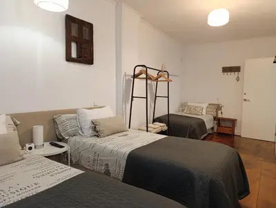 Cama o camas de una habitación en Pamplona centro Mercaderes 12