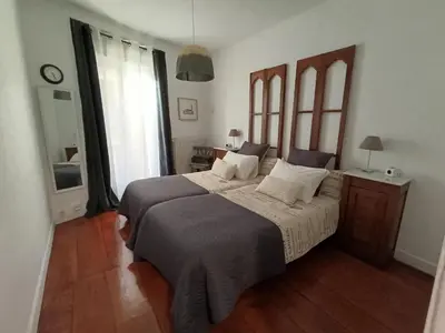 Cama o camas de una habitación en Pamplona centro Mercaderes 12