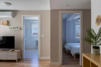Cama o camas de una habitación en La Vista de Zaragoza