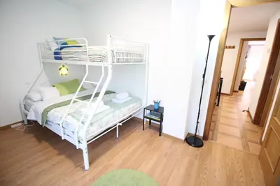 Cama o camas de una habitación en Gran Piso con Parking Privado