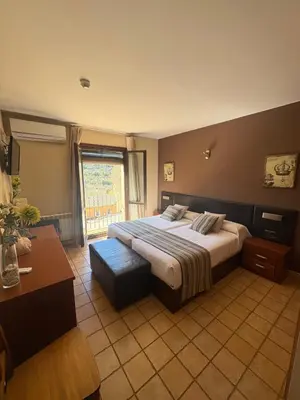 Cama o camas de una habitación en Hotel Guara Inlukā