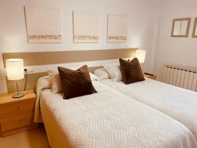 Cama o camas de una habitación en Apartamentos Alcañiz, Blanca