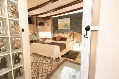 Cama o camas de una habitación en Lo Raconet d'Arnes