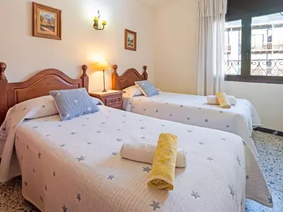 Cama o camas de una habitación en Belvilla by OYO Apartamento â€œLa Cabanaâ€