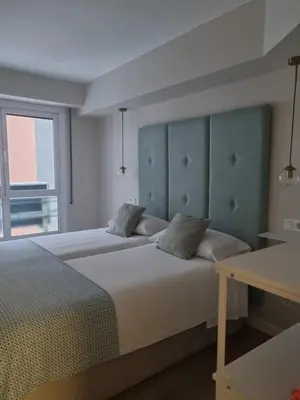 Cama o camas de una habitación en La parada de San Domingo 2