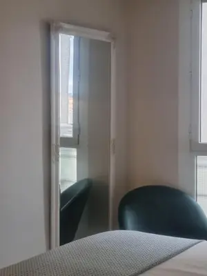 Cama o camas de una habitación en La parada de San Domingo 2