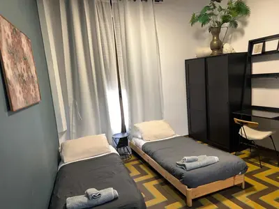 Cama o camas de una habitación en Casa Cedro historia y confort parking gratuito
