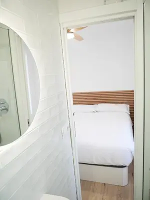 Cama o camas de una habitación en Precioso ático con vistas en el centro de Pamplona