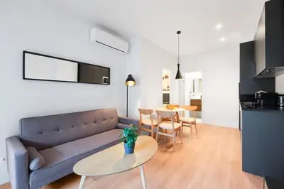 Una televisión o centro de entretenimiento en Apartamento Posidonia