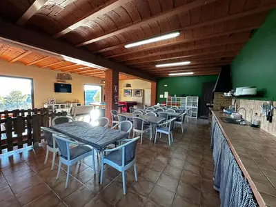 Un restaurante o sitio para comer en Casa Tapioles