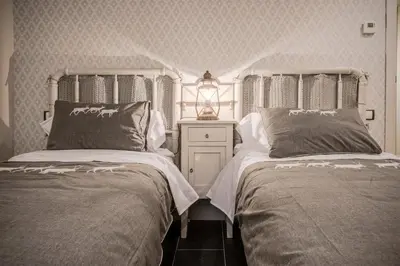 Cama o camas de una habitación en Casa Natal del Gigante de Sallent