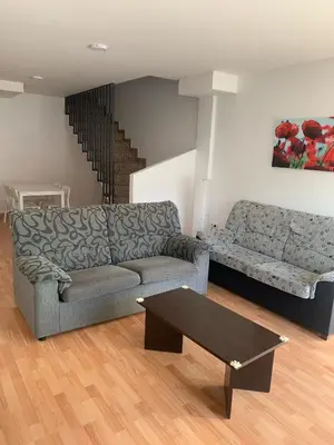 Zona de estar de APARTAMENTOS ANDORRA en TERUEL