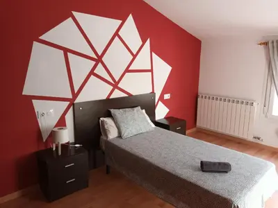Cama o camas de una habitación en APARTAMENTOS ANDORRA en TERUEL