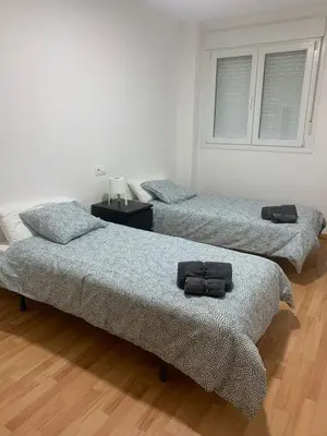 Cama o camas de una habitación en APARTAMENTOS ANDORRA en TERUEL