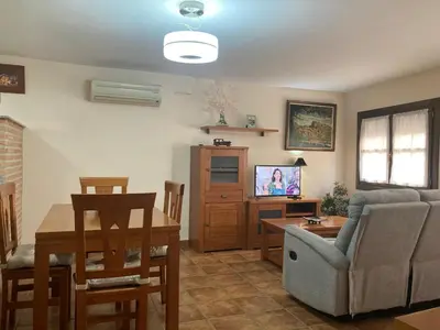 Una televisión o centro de entretenimiento en Apartamento O'royo