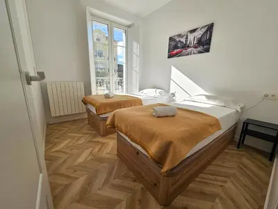 Cama o camas de una habitación en Apartamentos Ciudadela Superior 3000
