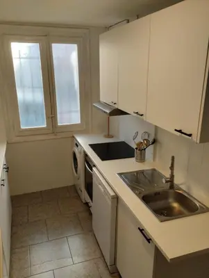 Una cocina o zona de cocina en Céntrico y equipado apartamento
