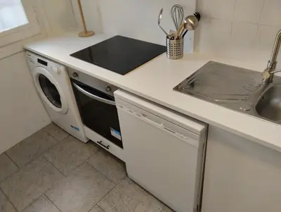 Una cocina o zona de cocina en Céntrico y equipado apartamento