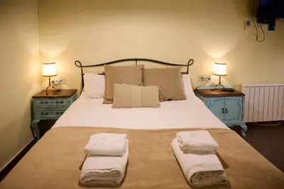 Cama o camas de una habitación en Loft El Roure, El Vilosell
