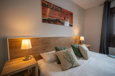 Cama o camas de una habitación en Apartamento con Encanto Baqueira 1500