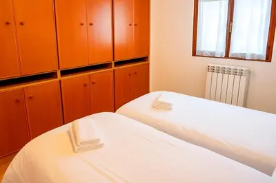 Cama o camas de una habitación en Mirador de Biescas