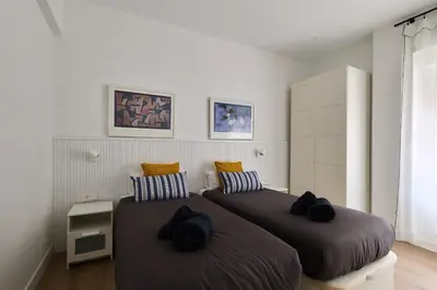 Cama o camas de una habitación en Exclusivo Apartamento en el alma de Pamplona