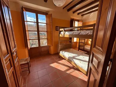 Cama o camas de una habitación en Cal Capdevila