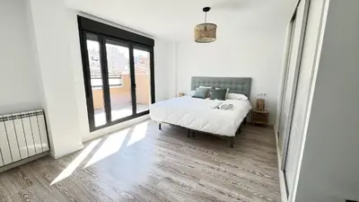 Cama o camas de una habitación en Apartamenticos Living San Pablo