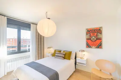 Cama o camas de una habitación en Magnifico apartamento a 5 minutos de Pamplona