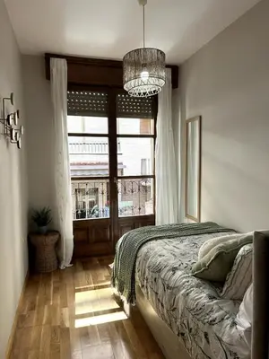 Cama o camas de una habitación en NA San Miguel