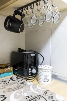 Una cocina o zona de cocina en Apartamento familiar independiente junto al Pilar - Alfonso Suites