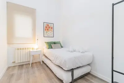 Cama o camas de una habitación en Your luxury getaway in downtown Zaragoza